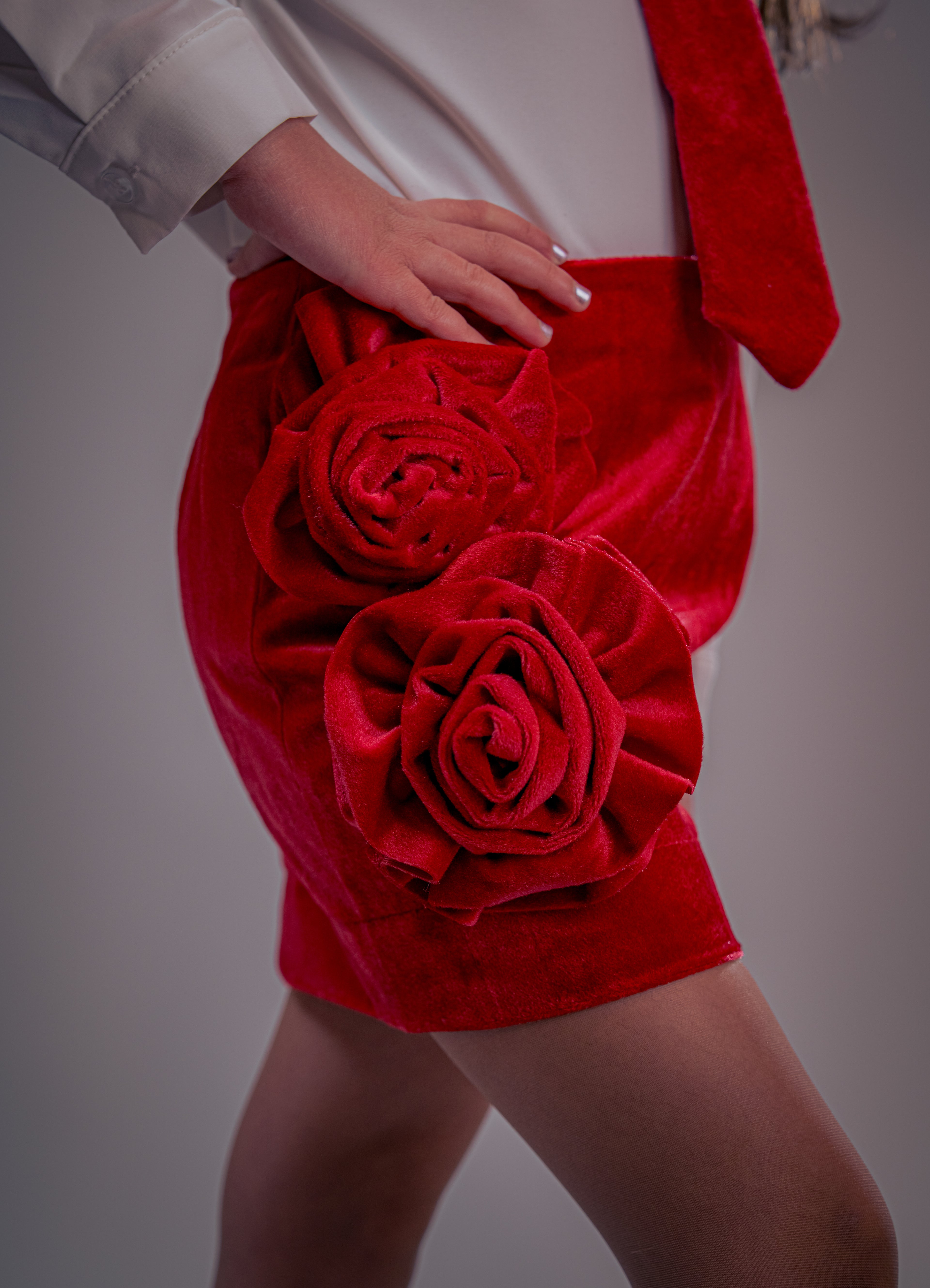 Deep-red skirt with bold roses